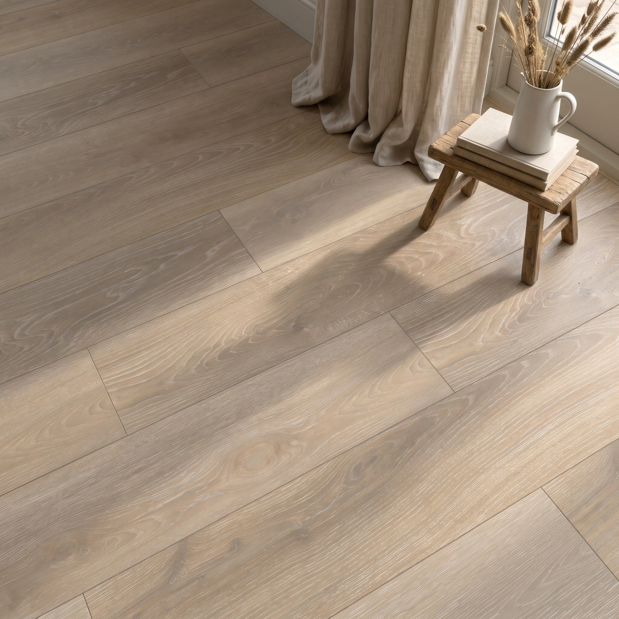 Alderley Light Wood Effect tiles laid as a floor in a room with a linen curtain and a small wooden stool holding a jug of